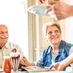 Mature couple dining out