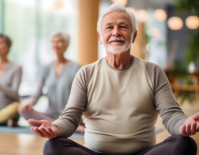 Old man doing yoga