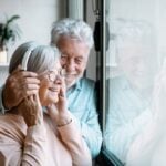 two seniors listening to music together